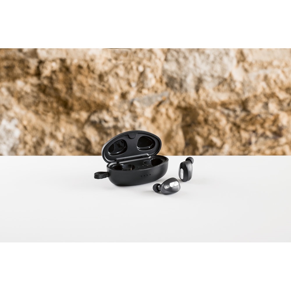 DESCRY. Chargeur sans fil en zinc et ecouteurs sans fil en métal et ABS